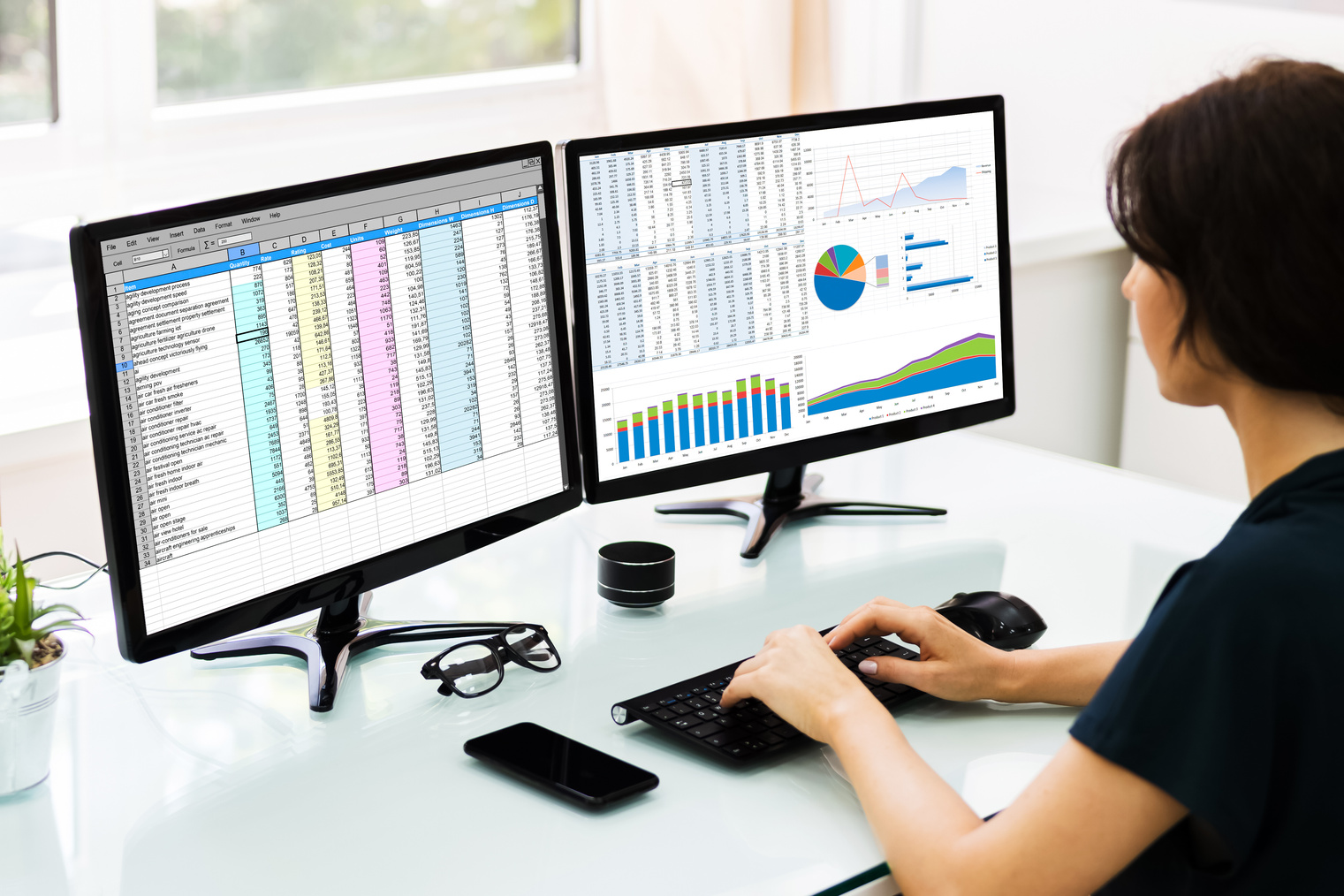 Analyst Employee Working With Spreadsheet